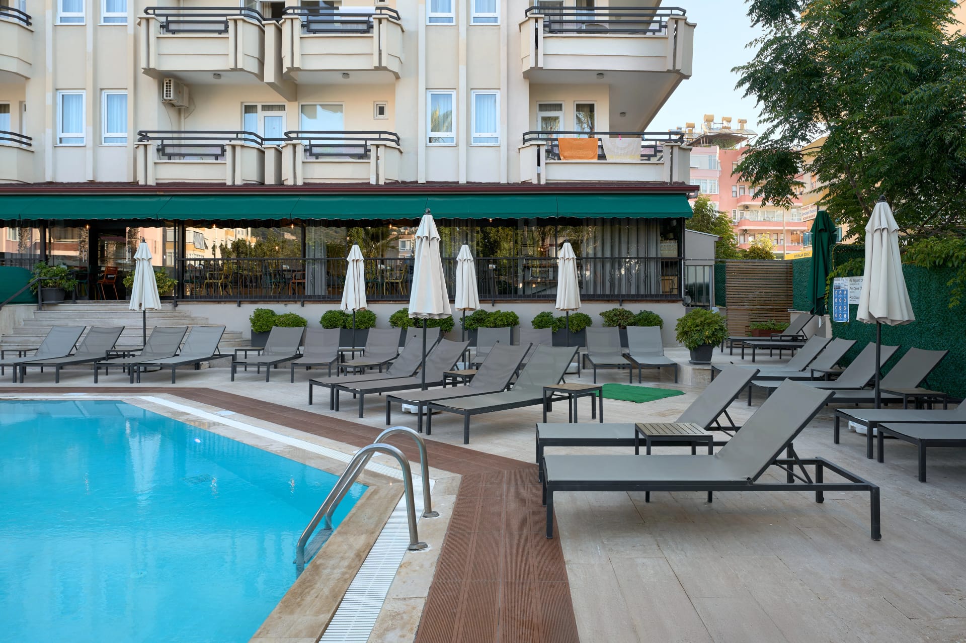 Poolside lounge chairs at Prince Alanya Apart Hotel