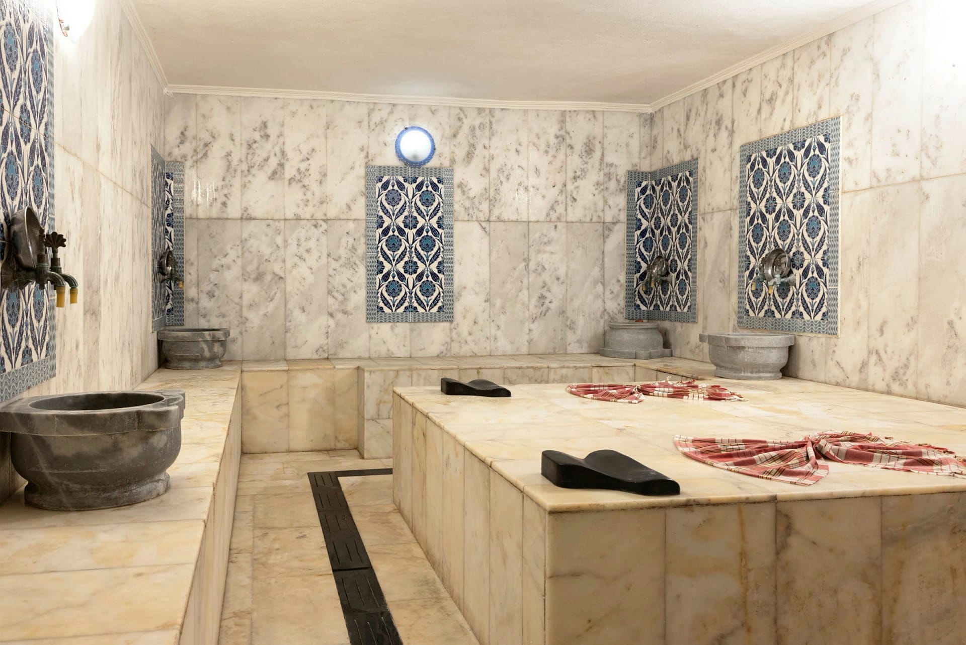 Traditional Turkish hammam with marble and İznik tilework at Prince Alanya Apart Hotel